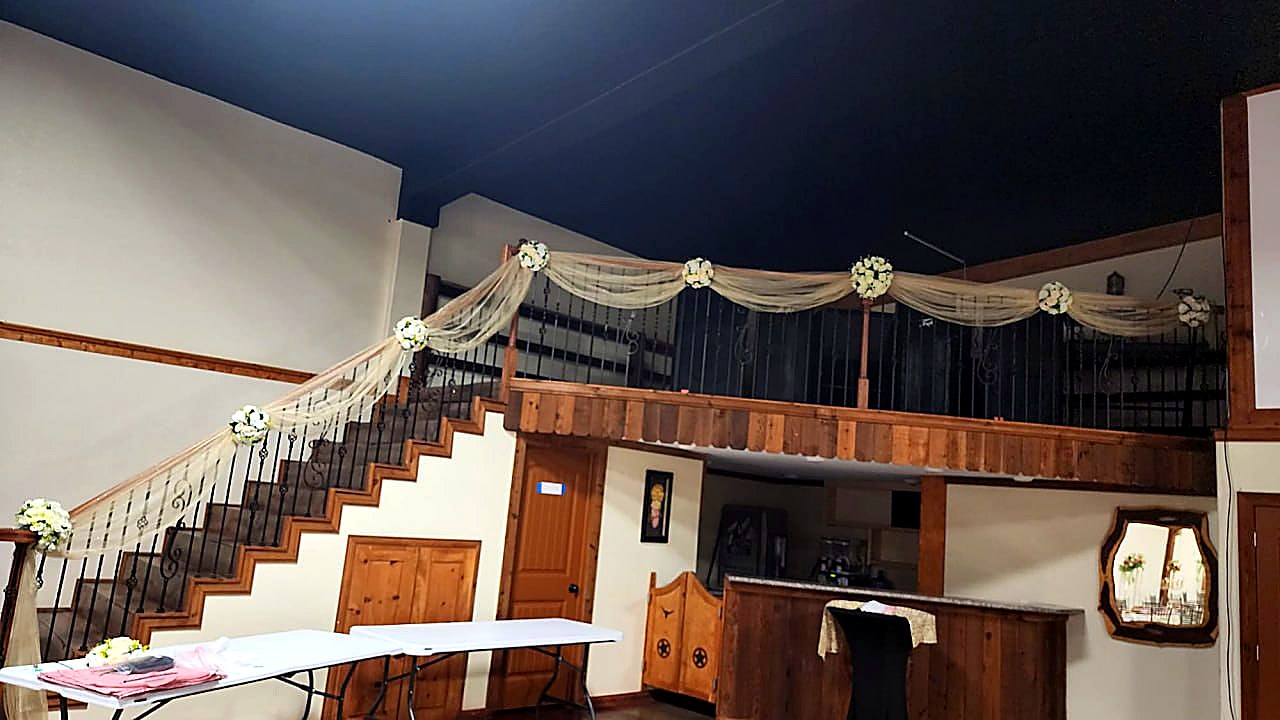 Grand Staircase & Balcony — Golden Petals Reception Hall Cypress TX